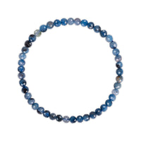 Multi colored blue beaded bracelet on a white background