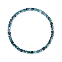 Bracelet with blue and green beaded stones on a white background