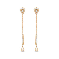 A pair of 18k gold diamond earrings with a teardrop design and a chain link attachment.
