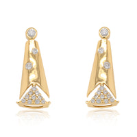 A pair of 18k gold diamond earrings with a geometric design
