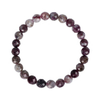 reddish purple beaded bracelet on a white background