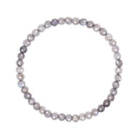 Beaded bracelet with gray and white stones on a white background