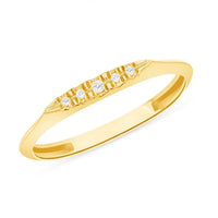 Gold band with 5 diamonds on white background