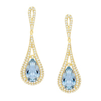 pair of tear drop gold earrings with pear shaped aquamarines and surrounded by diamonds
