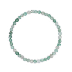 Green and white beaded bracelet on a white background