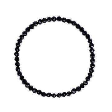 Black beaded tourmaline bracelet on a white background