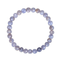 Round faceted beaded bracelet with a gradient of purple and gray on a white background