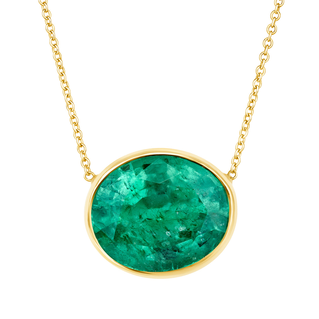 Gold necklace with an emerald gemstone pendant on a white background