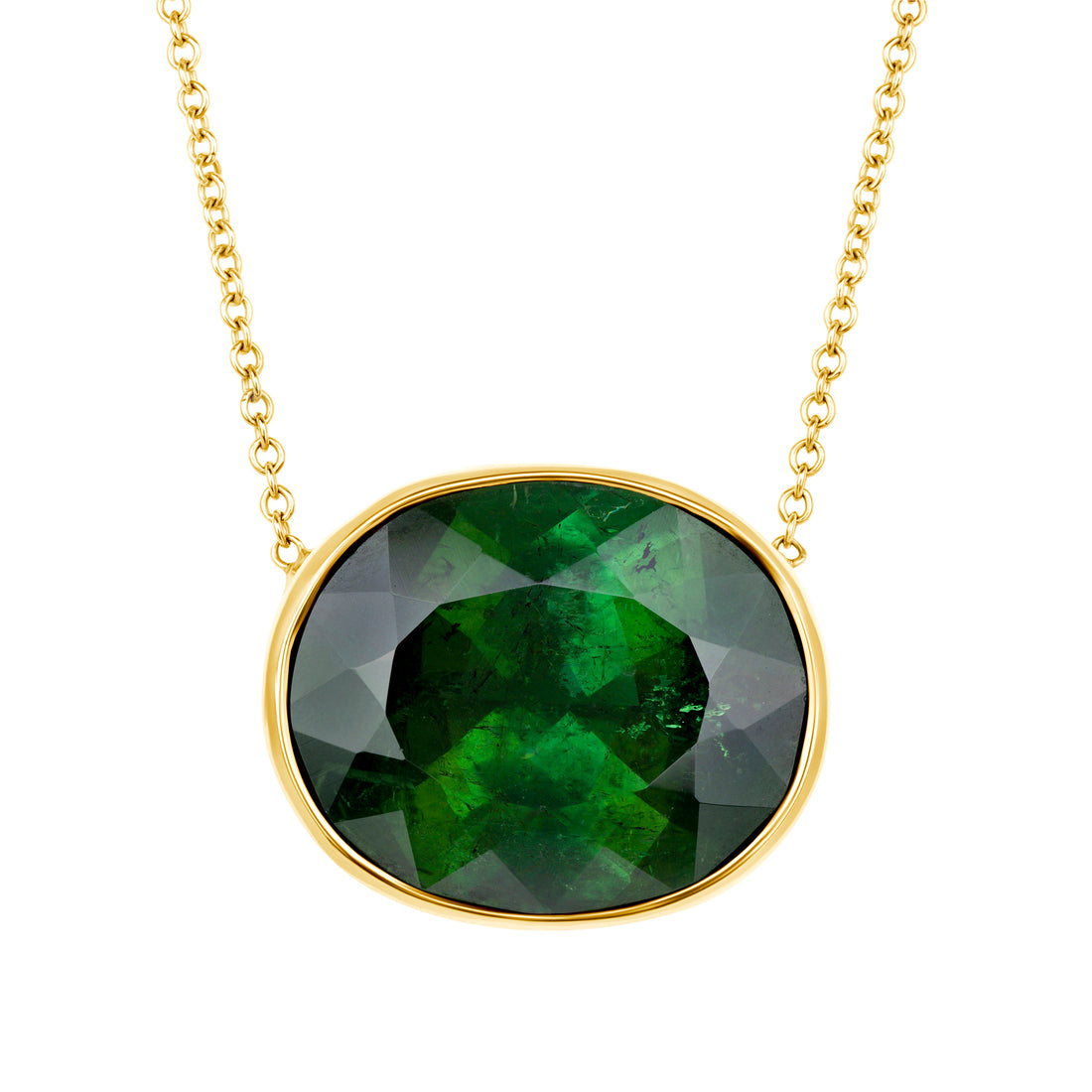 Green gemstone necklace with gold chain on a white background