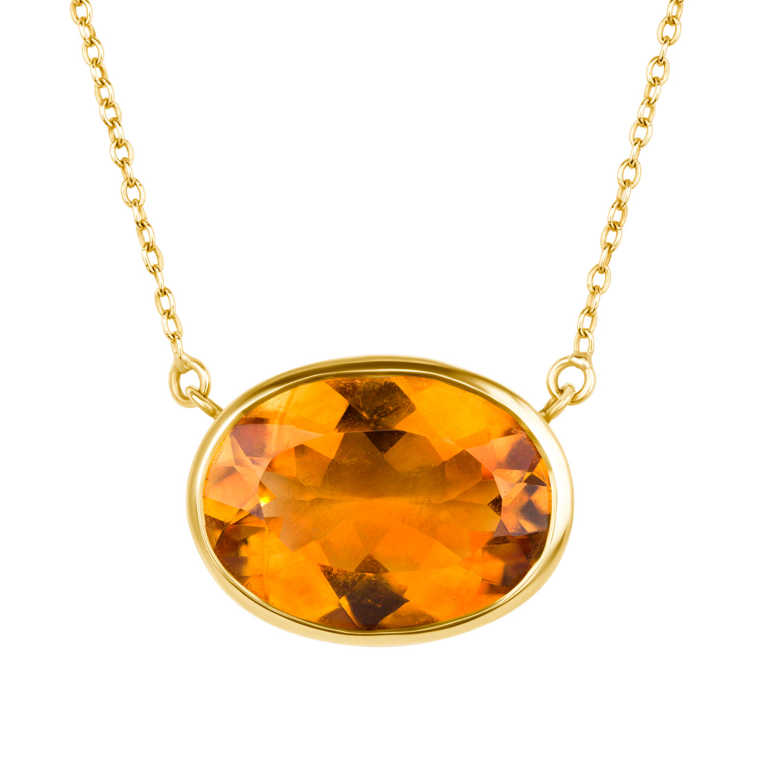 Gold necklace with an orange gemstone pendant on a white background