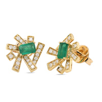 A pair of 18k gold earrings featuring green emerald stones with a starburst of diamond and gold accents.