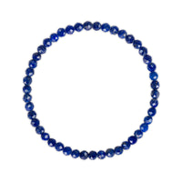 Blue beaded bracelet on a white background