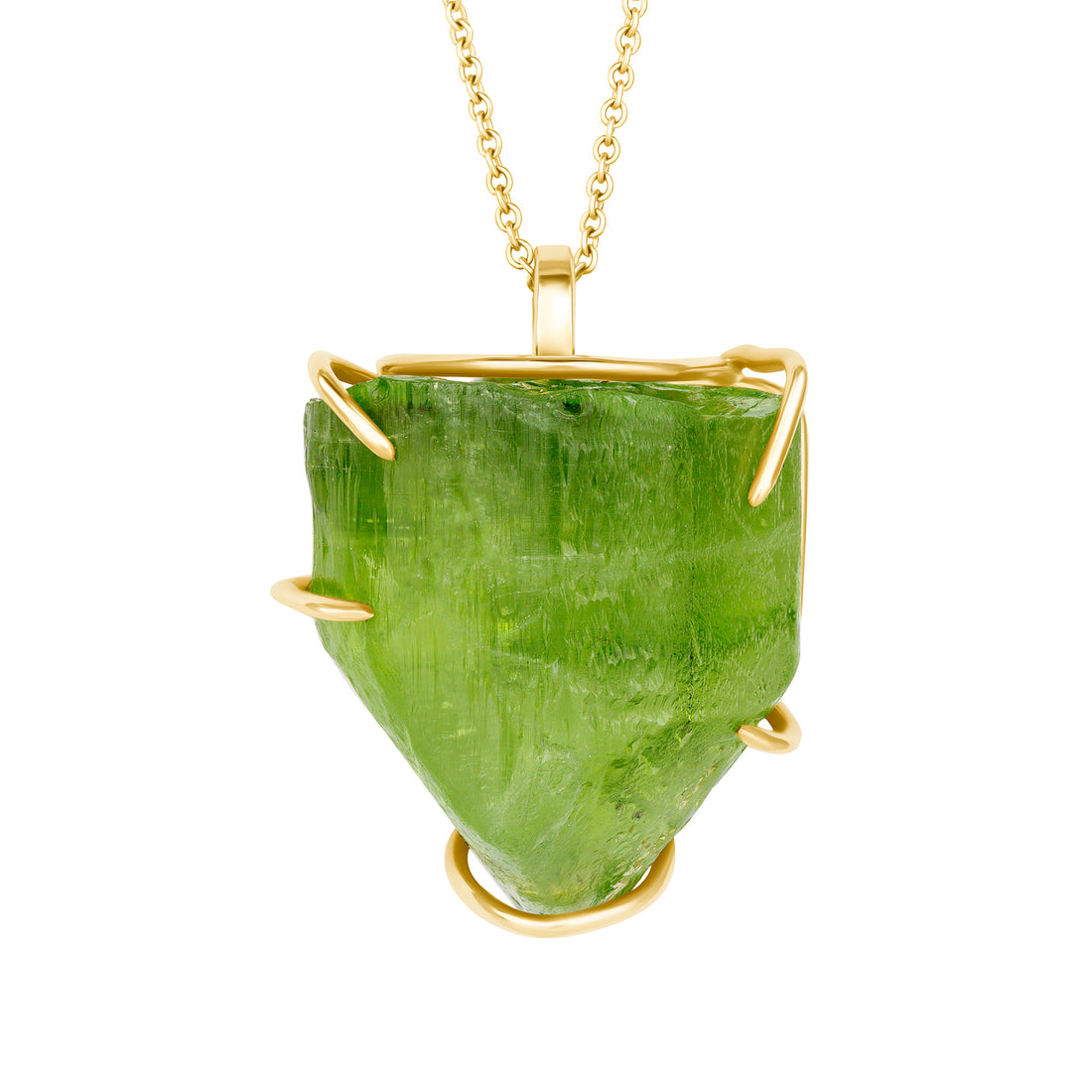 Natural raw peridot stone pendant with gold frame on a white background
