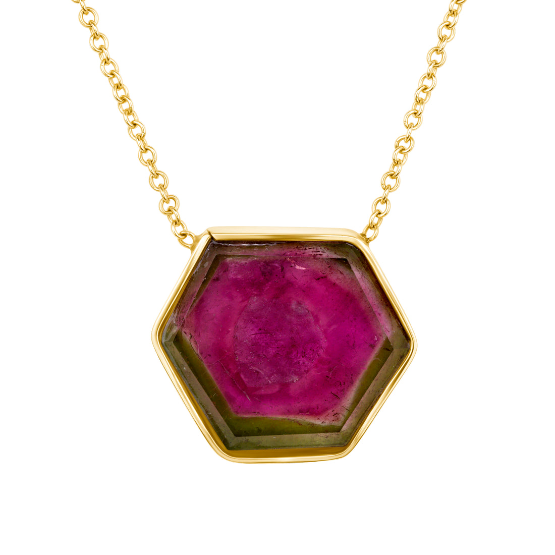 Hexagonal ruby colored gemstone with green edge pendant on a gold chain against a white background