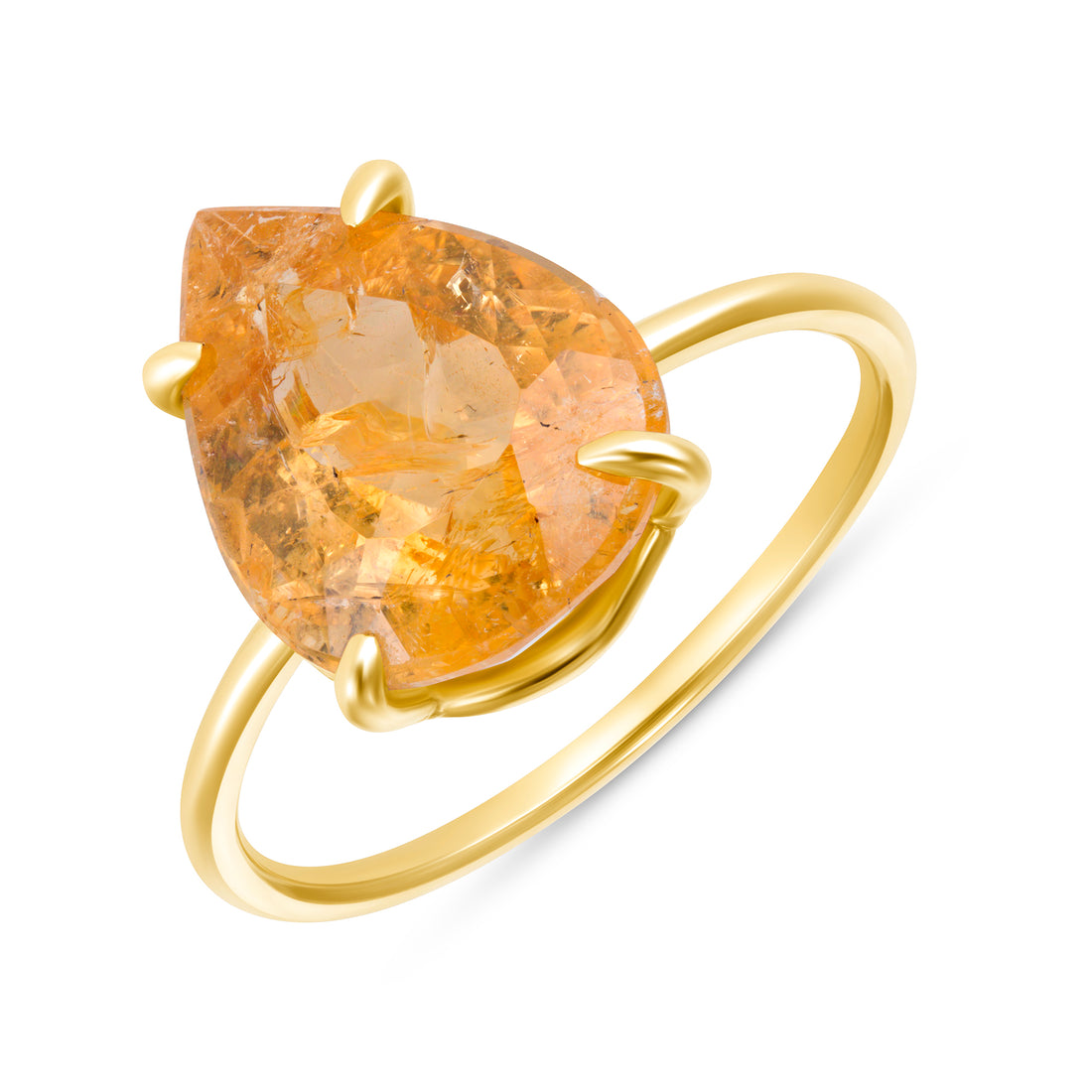 Gold ring with a large pear shaped orange gemstone on a white background