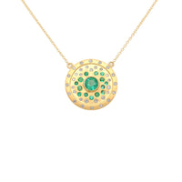 Gold pendant with a green gemstone  centerwswtone and multiple emeralds and diamond accent stones on a white background
