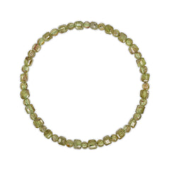 Green beaded necklace on a white background