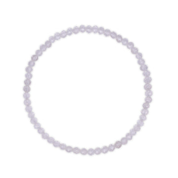 Faceted clear quartz gemstone bracelet on a white background