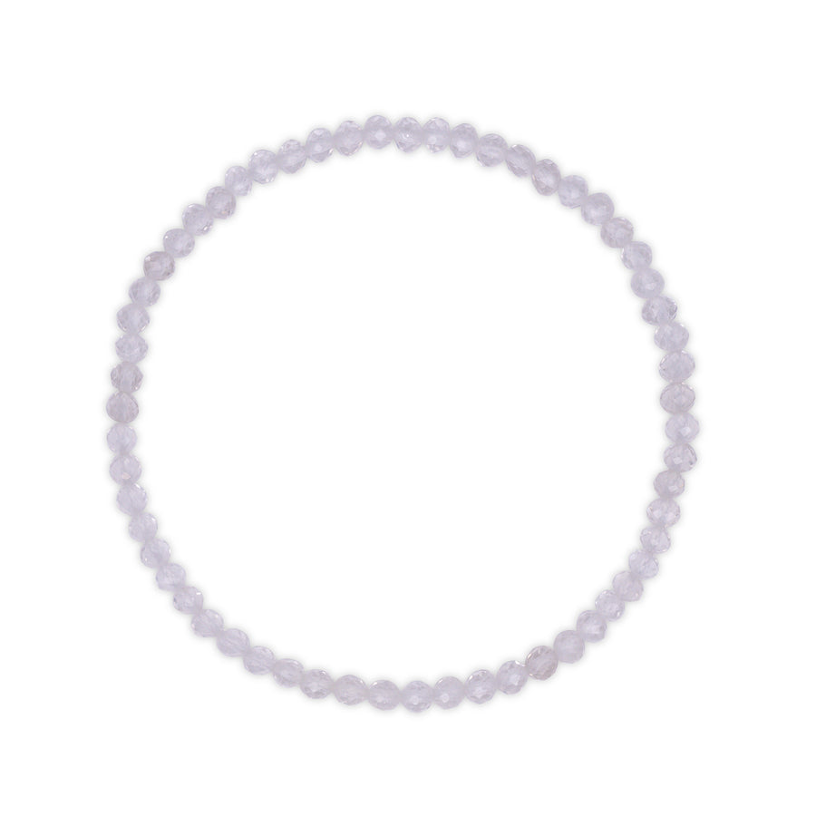 Faceted clear quartz gemstone bracelet on a white background