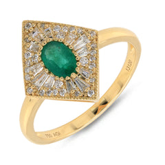 An 18k gold ring with a central emerald surrounded by a crown and halo of diamonds