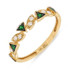 An 18k gold ring with alternating emerald and diamond stones along its band.
