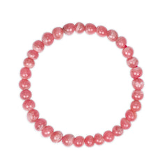 Peachy pink beaded bracelet on a white background