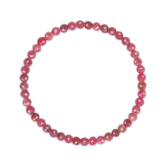Pink beaded bracelet on a white background