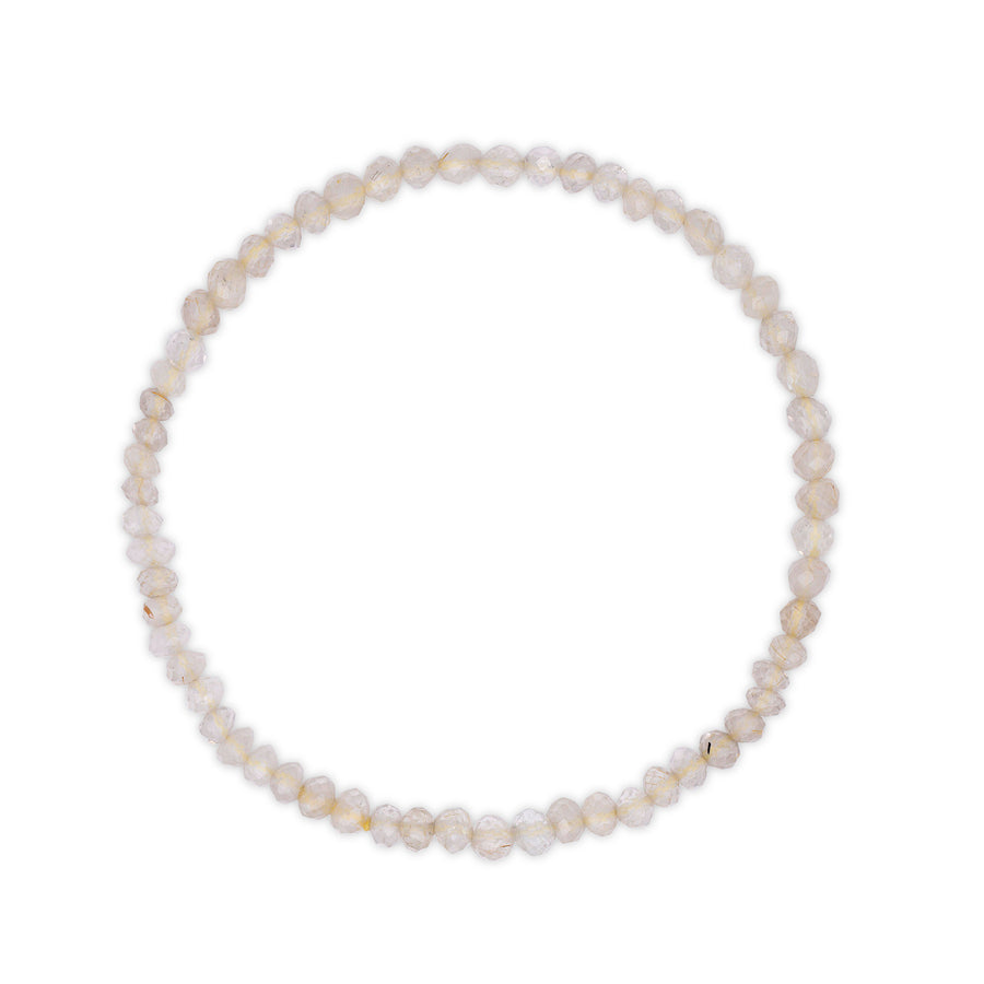 Rutilated clear quartz bracelet on a white background