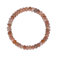 Beaded bracelet with multicolored stones on a white background