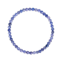 Blue beaded bracelet on a white background
