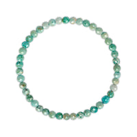 Turquoise beaded bracelet on a white background