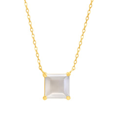 A gold necklace featuring a blue moonstone pendant.