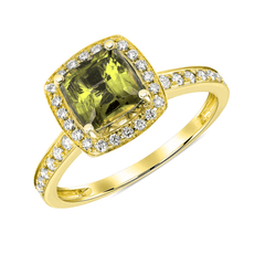 Gold ring with a cushion-cut Peridot, haloed in radiant diamonds with additional pavé diamonds cascading down the band 