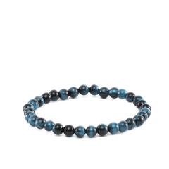 Blue and brown tigers eye beaded bracelet on white background.