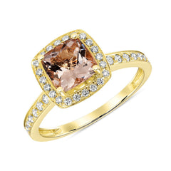 Gold ring with a cushion-cut Morganite gemstone, haloed in radiant diamonds with additional pavé diamonds cascading down the band 