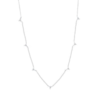 Dainty 18kt gold necklace adorned with 7 diamonds points