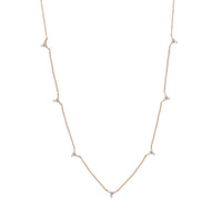 Dainty 18kt gold necklace adorned with 7 diamonds points