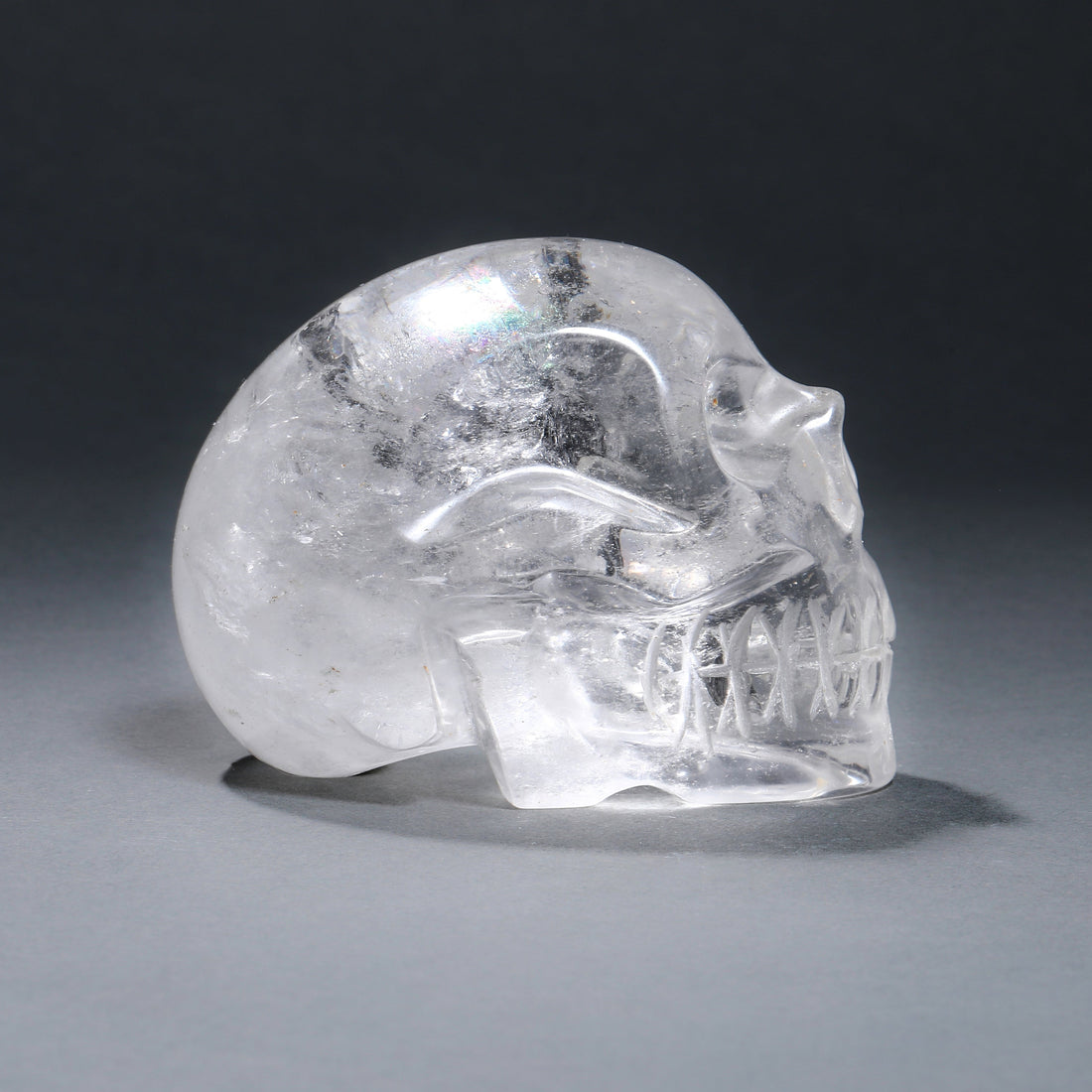 clear quartz carved skull side view
